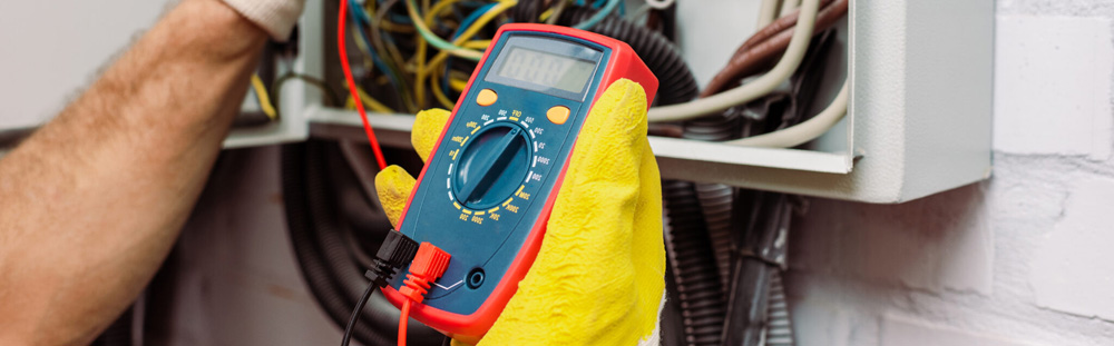 using a multimeter to test electrical wiring in a panel in Glendale CO